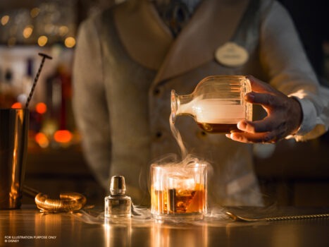 Disneyland® Hotel - Fleur de Lys Bar - Bartender pouring a cocktail