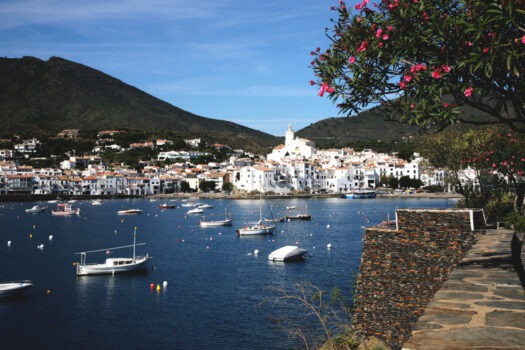 Panoramic view of Cadaqués with boats in the bay