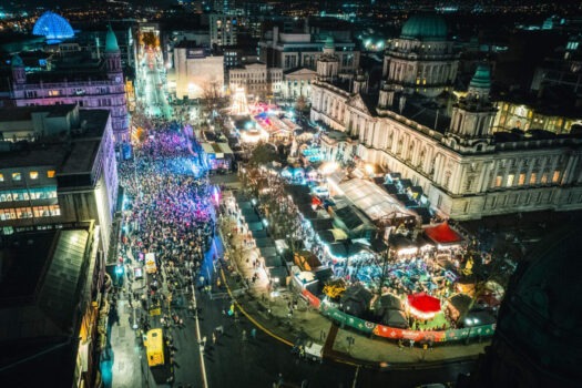 Belfast, Ireland - Aerial view of Belfast Christmas Market at night ©Courtesy of Kyle Brickley, Tourism Ireland - EXPIRES 28.11.2028