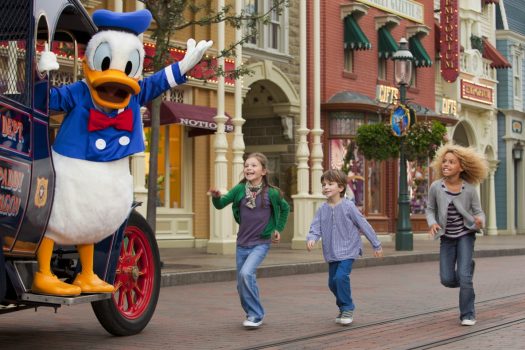 Children with Donald Duck © Disney